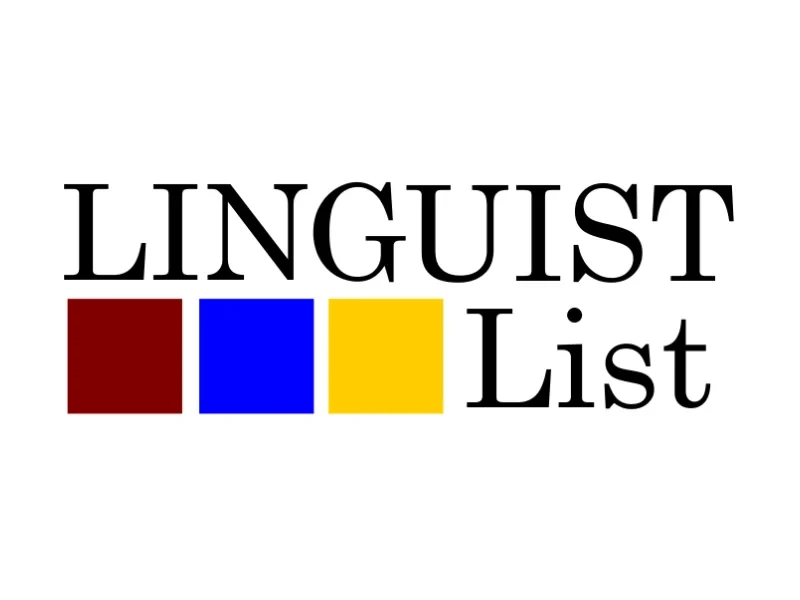 Eine Wissenschaftlerin und ein Wissenschaftler arbeiten hinter einer Glasfassade und mischen Chemikalien mit Großgeräten.